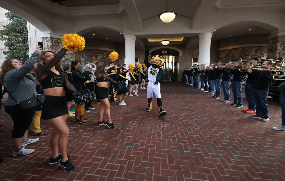 The Iowa Spirit Squad and Pep Band during a send off at the hotel before their game against the NC State Wolfpack in the regional semi-final of the 2019 NCAA Women's College Basketball Tournament Saturday, March 30, 2019 at Greensboro Coliseum in Greensboro, NC.(Brian Ray/hawkeyesports.com)