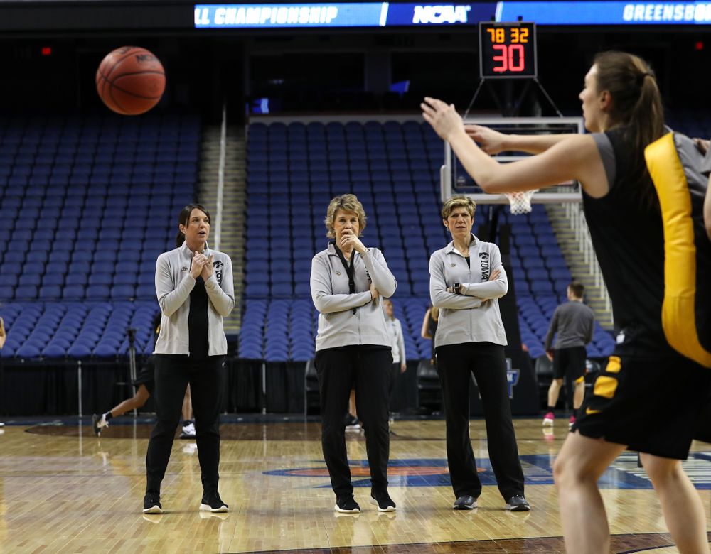 Iowa Hawkeyes head coach Lisa Bluder, associate head coach Jan Jensen, and director of player development Abby Stamp during media and practice as they prepare for their Sweet 16 matchup against NC State Friday, March 29, 2019 at the Greensboro Coliseum in Greensboro, NC.(Brian Ray/hawkeyesports.com)
