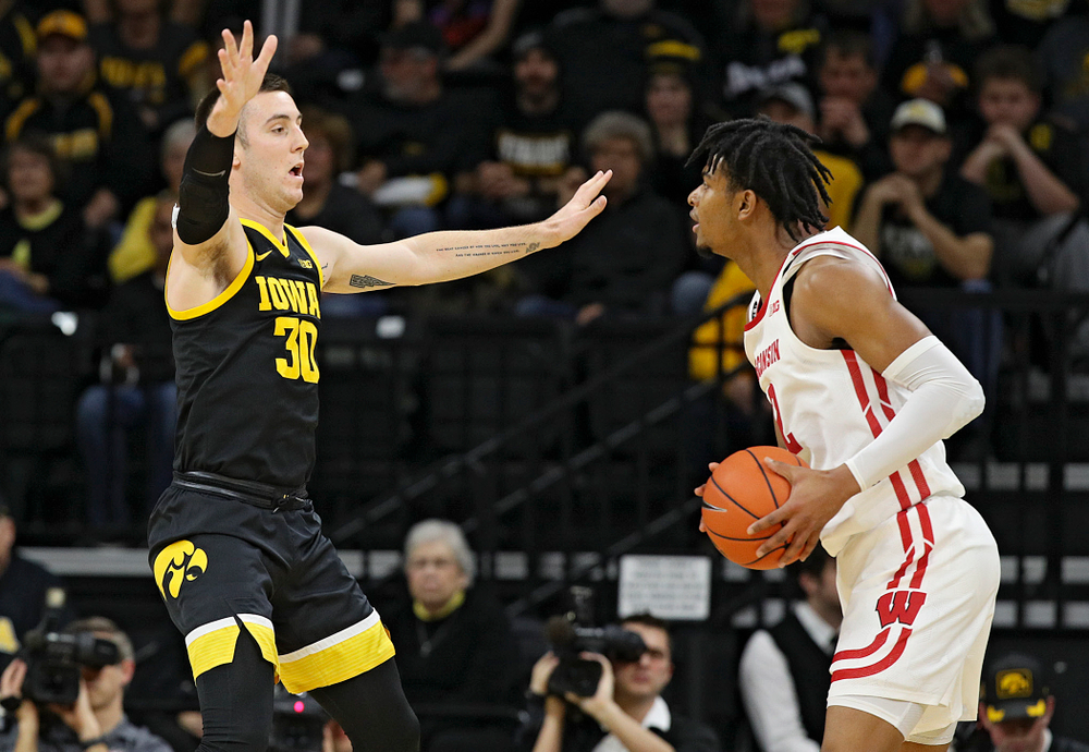 Iowa Hawkeyes guard Connor McCaffery (30) defends during the first half of their game at Carver-Hawkeye Arena in Iowa City on Monday, January 27, 2020. (Stephen Mally/hawkeyesports.com)