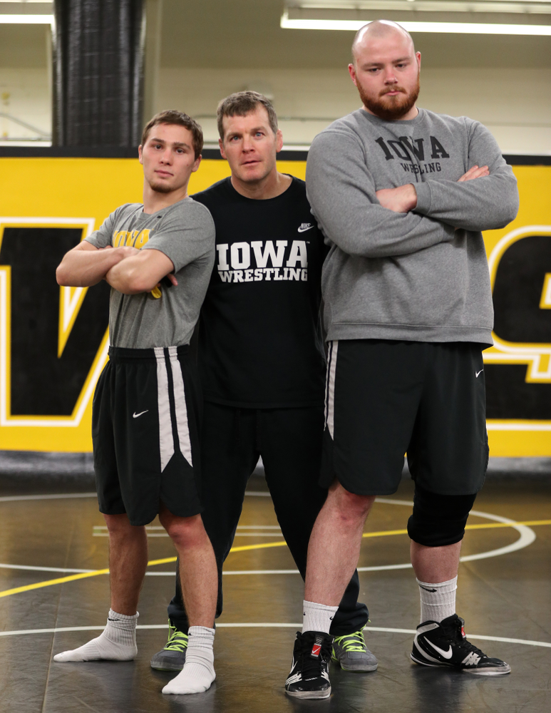 Iowa Hawkeyes head coach Tom Brands poses with Spencer Lee and Sam Stoll during the team's annual media day Monday, November 5, 2018 at Carver-Hawkeye Arena. (Brian Ray/hawkeyesports.com)