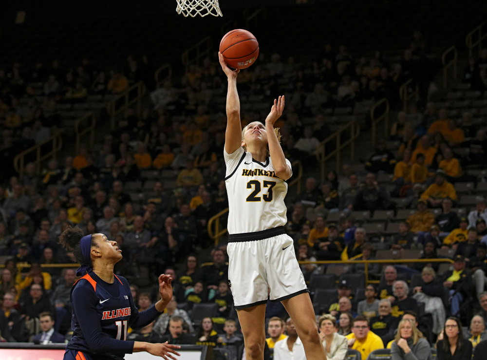 Iowa Hawkeyes forward Logan Cook (23) scores a basket during the fourth quarter of their game at Carver-Hawkeye Arena in Iowa City on Tuesday, December 31, 2019. (Stephen Mally/hawkeyesports.com)