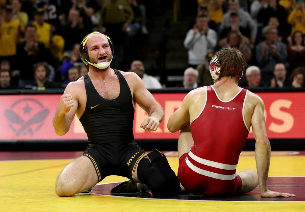 IowaÕs Alex Marinelli wrestles WisconsinÕs Evan Wick at 165 pounds Sunday, December 1, 2019 at Carver-Hawkeye Arena. Marinelli won the match 4-2. (Brian Ray/hawkeyesports.com)