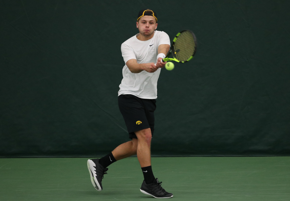 Iowa's Will Davies against UMKC Friday, February 15, 2019 at the Hawkeye Tennis and Recreation Complex. (Brian Ray/hawkeyesports.com)