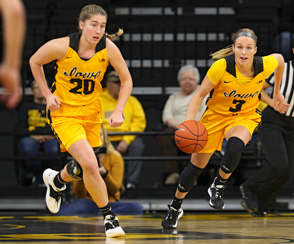 Iowa guard Makenzie Meyer (3) brings the ball down court with guard Kate Martin (20) during the first quarter of their game against Winona State at Carver-Hawkeye Arena in Iowa City on Sunday, Nov 3, 2019. (Stephen Mally/hawkeyesports.com)