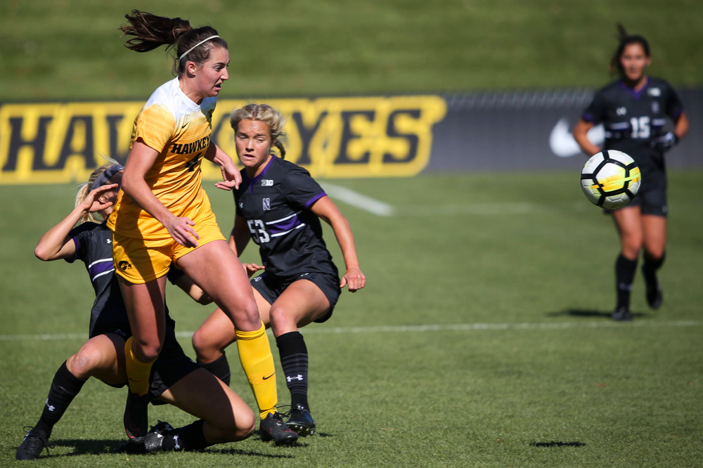 Iowa Hawkeyes forward Kaleigh Haus (4) passes the ball during a game against Northwestern at the Iowa Soccer Complex on October 21, 2018. (Tork Mason/hawkeyesports.com)