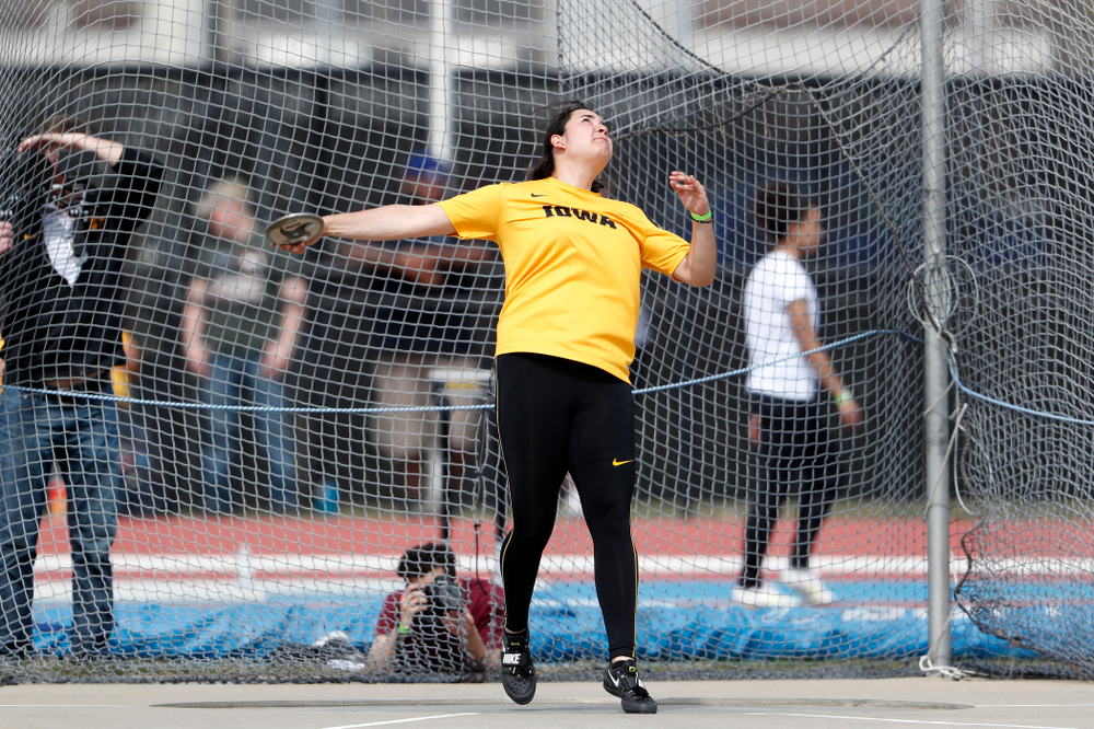 Iowa's Konstadina Spanoudakis competes in the discus during the 2018 MUSCO Twilight Invitational Thursday, April 12, 2018 at the Cretzmeyer