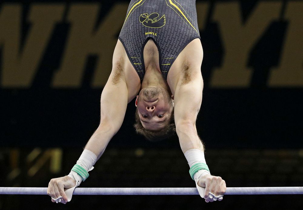 Iowa's Rogelio Vazquez competes in the horizontal bar during the first day of the Big Ten Men's Gymnastics Championships at Carver-Hawkeye Arena in Iowa City on Friday, Apr. 5, 2019. (Stephen Mally/hawkeyesports.com)