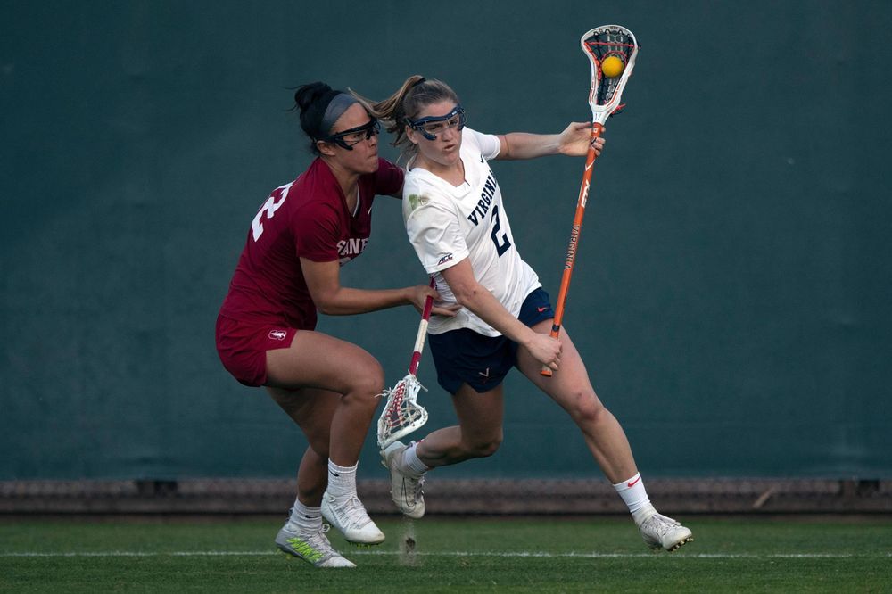 STANFORD, California - FEBRUARY 14: Virginia Cavaliers midfield Sammy Mueller (2) is defended by Stanford Cardinal midfield Daniella McMahon (32) during the second half at Cagan Stadium on February 14, 2020 in Stanford, California. The Virginia Cavaliers defeated the Stanford Cardinal 12-11. (Photo by Jason O. Watson)