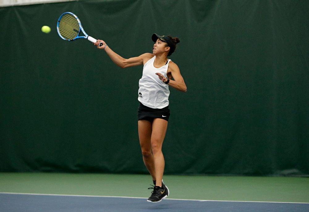 Iowa’s Michelle Bacalla returns a shot during her singles match at the Hawkeye Tennis and Recreation Complex in Iowa City on Sunday, February 23, 2020. (Stephen Mally/hawkeyesports.com)