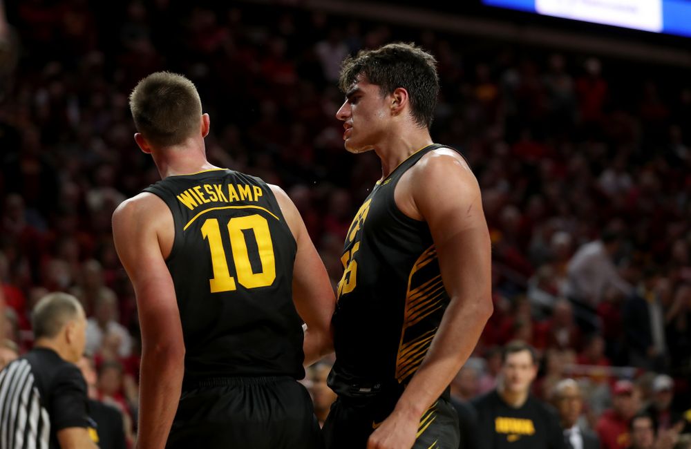 Iowa Hawkeyes forward Luka Garza (55) and guard Joe Wieskamp (10) against the Iowa State Cyclones Thursday, December 12, 2019 at Hilton Coliseum in Ames, Iowa(Brian Ray/hawkeyesports.com)