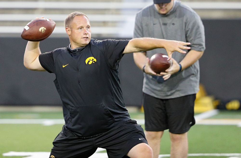 Iowa Hawkeyes linebackers coach Seth Wallace throws a pass during Fall Camp Practice No. 12 at Kinnick Stadium in Iowa City on Thursday, Aug 15, 2019. (Stephen Mally/hawkeyesports.com)