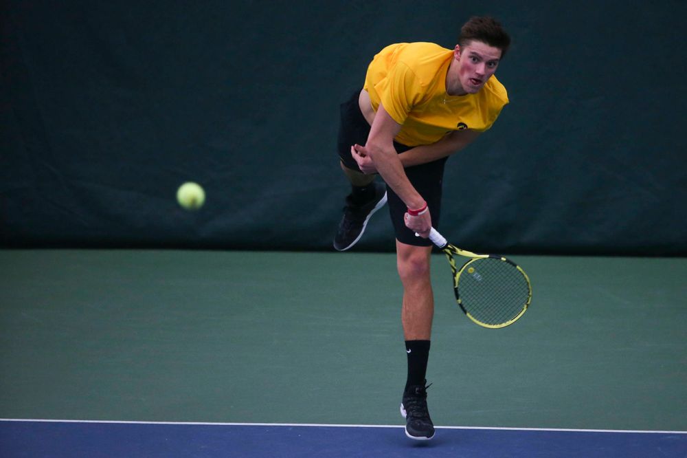 Iowa's Piotr Smietana at a tennis match vs Drake Friday, March 8, 2019 at the Hawkeye Tennis and Recreation Complex. (Lily Smith/hawkeyesports.com)