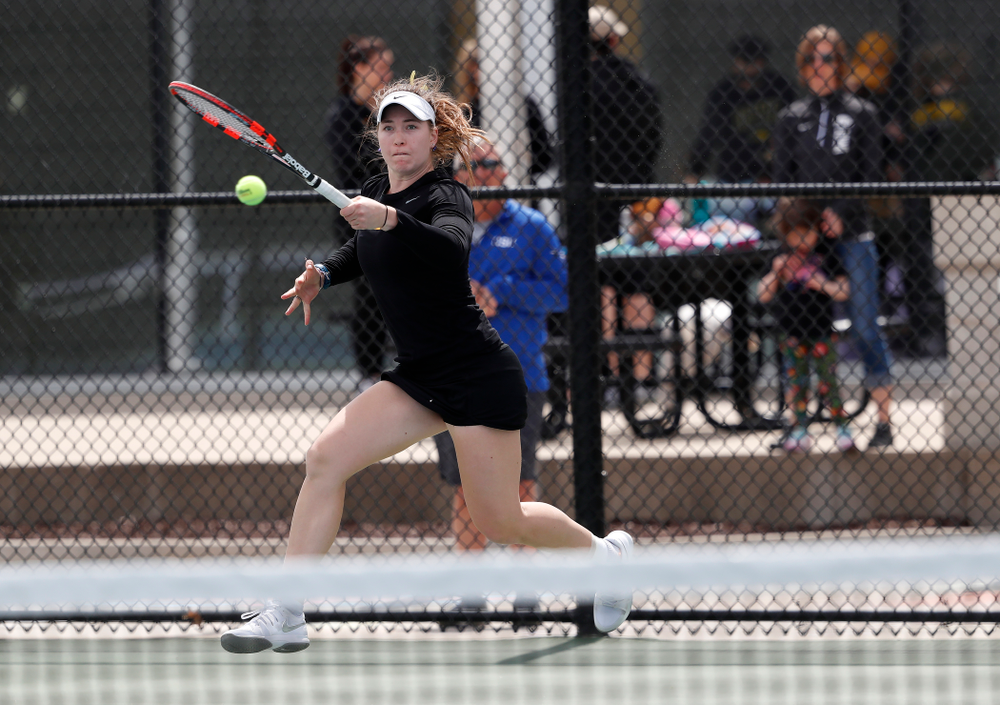Elise Van Heuvelen and Anastasia Reimchen play a doubles match against the Wisconsin Badgers Sunday, April 22, 2018 at the Hawkeye Tennis and Recreation Center. (Brian Ray/hawkeyesports.com)