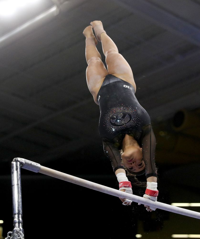 Iowa’s Clair Kaji competes on the bars against Michigan Friday, February 14, 2020 at Carver-Hawkeye Arena. (Brian Ray/hawkeyesports.com)