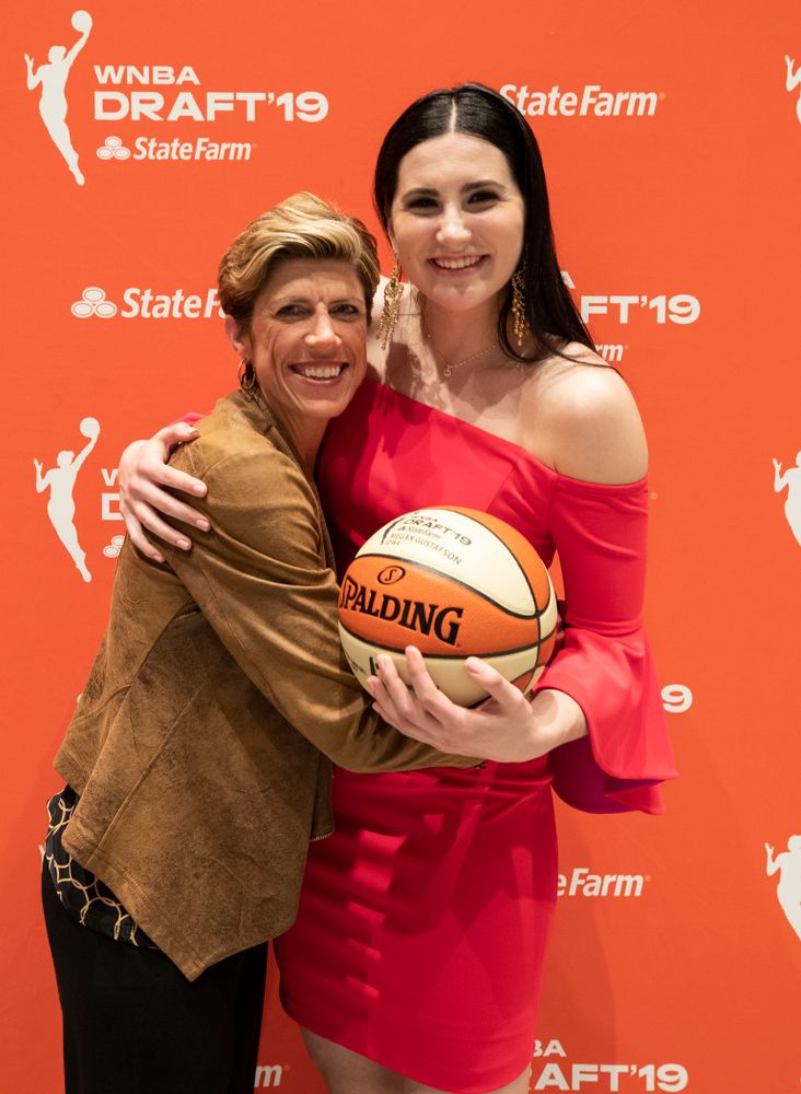 Iowa Hawkeyes forward Megan Gustafson (10) with associate head coach Jan Jensen after being selected by the Dallas Wings in the second round of the 2019 WNBA Draft Wednesday, April 10, 2019 at Nike New York Headquarters in New York City. (Brian Ray/hawkeyesports.com)