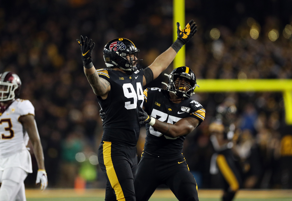 Iowa Hawkeyes defensive end A.J. Epenesa (94) celebrates a sack against the Minnesota Golden Gophers Saturday, November 16, 2019 at Kinnick Stadium. (Brian Ray/hawkeyesports.com)