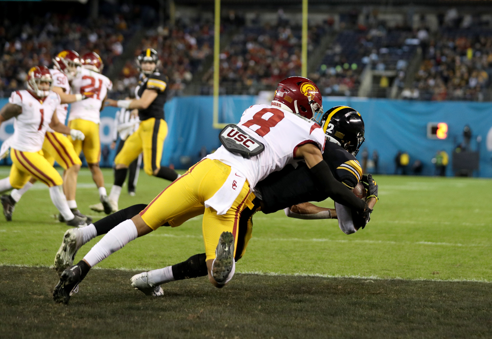 Iowa Hawkeyes wide receiver Brandon Smith (12) catches a touchdown pass against USC in the Holiday Bowl Friday, December 27, 2019 at San Diego Community Credit Union Stadium. (Brian Ray/hawkeyesports.com)