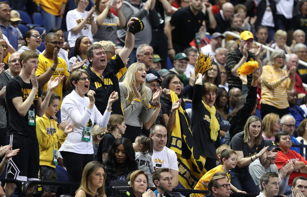 Fans cheer on the Iowa Hawkeyes against the NC State Wolfpack in the regional semi-final of the 2019 NCAA Women's College Basketball Tournament Saturday, March 30, 2019 at Greensboro Coliseum in Greensboro, NC.(Brian Ray/hawkeyesports.com)