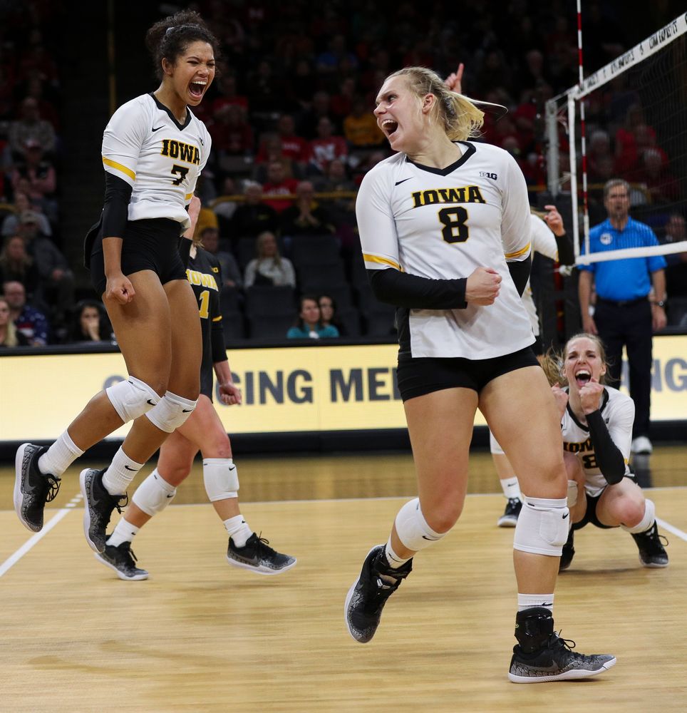 Iowa Hawkeyes setter Brie Orr (7) and Iowa Hawkeyes right side hitter Reghan Coyle (8) celebrate after winning a point during a match against Nebraska at Carver-Hawkeye Arena on November 7, 2018. (Tork Mason/hawkeyesports.com)