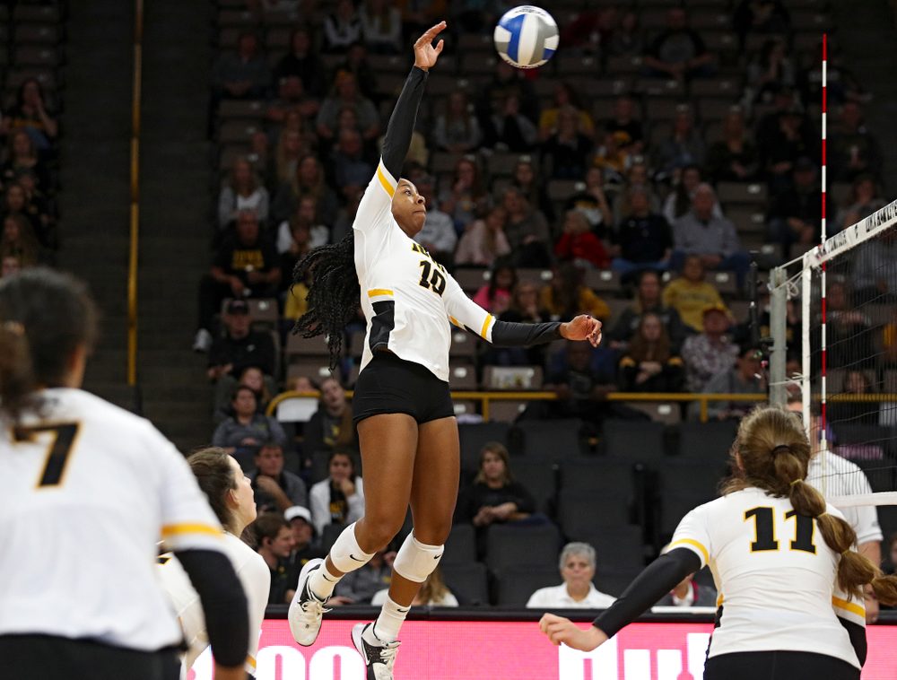 Iowa’s Griere Hughes (10) sends over a shot during the second set of their volleyball match at Carver-Hawkeye Arena in Iowa City on Sunday, Oct 13, 2019. (Stephen Mally/hawkeyesports.com)