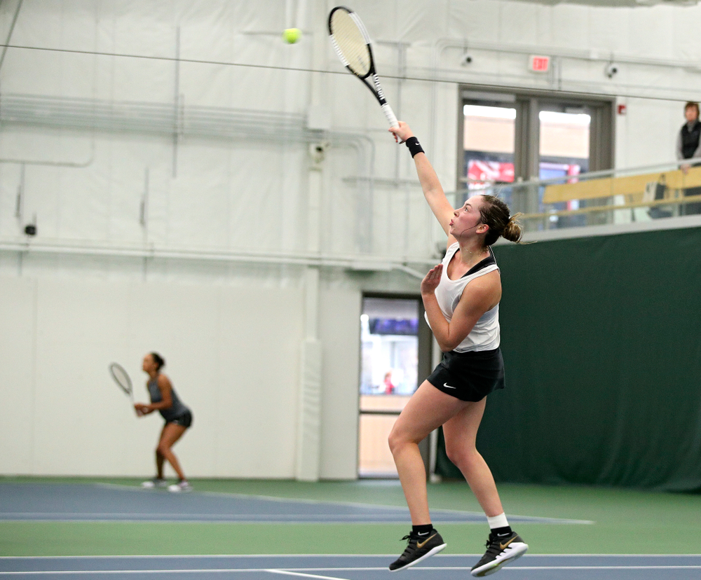Iowa’s Samantha Mannix returns a shot during her singles match at the Hawkeye Tennis and Recreation Complex in Iowa City on Sunday, February 23, 2020. (Stephen Mally/hawkeyesports.com)