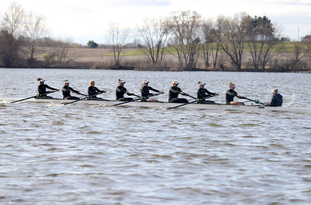 Iowa's Naomi Visser (from left), Elena Waiglein, Paige Schlapkohl, Hannah Greenlee, Hunter Koenigsfeld, Contessa Harold, Katie Pearson, Eve Stewart, and Logan Jones during their I Varsity 8 race against Minnesota in their Big Ten Double Dual Rowing Regatta at Lake Macbride in Solon on Saturday, Apr. 13, 2019. (Stephen Mally/hawkeyesports.com)