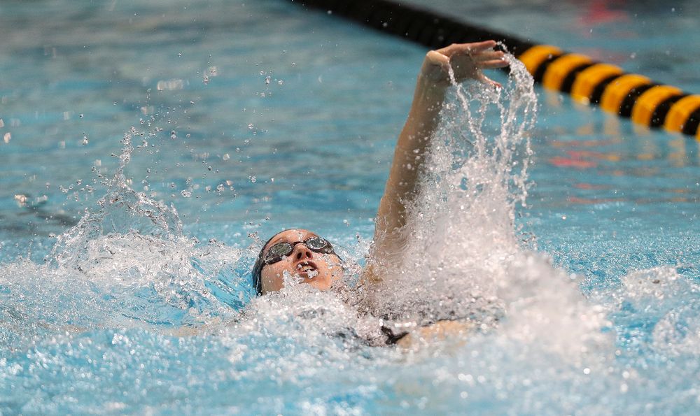 Iowa's Samantha Sauer competes in the 100-yard backstroke during the third day of the Hawkeye Invitational at the Campus Recreation and Wellness Center on November 16, 2018. (Tork Mason/hawkeyesports.com)