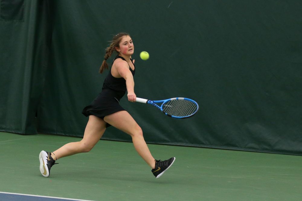 Iowa’s Erika Dodridge returns a hit during the Iowa women’s tennis meet vs UNI on Saturday, February 29, 2020 at the Hawkeye Tennis and Recreation Complex. (Lily Smith/hawkeyesports.com)