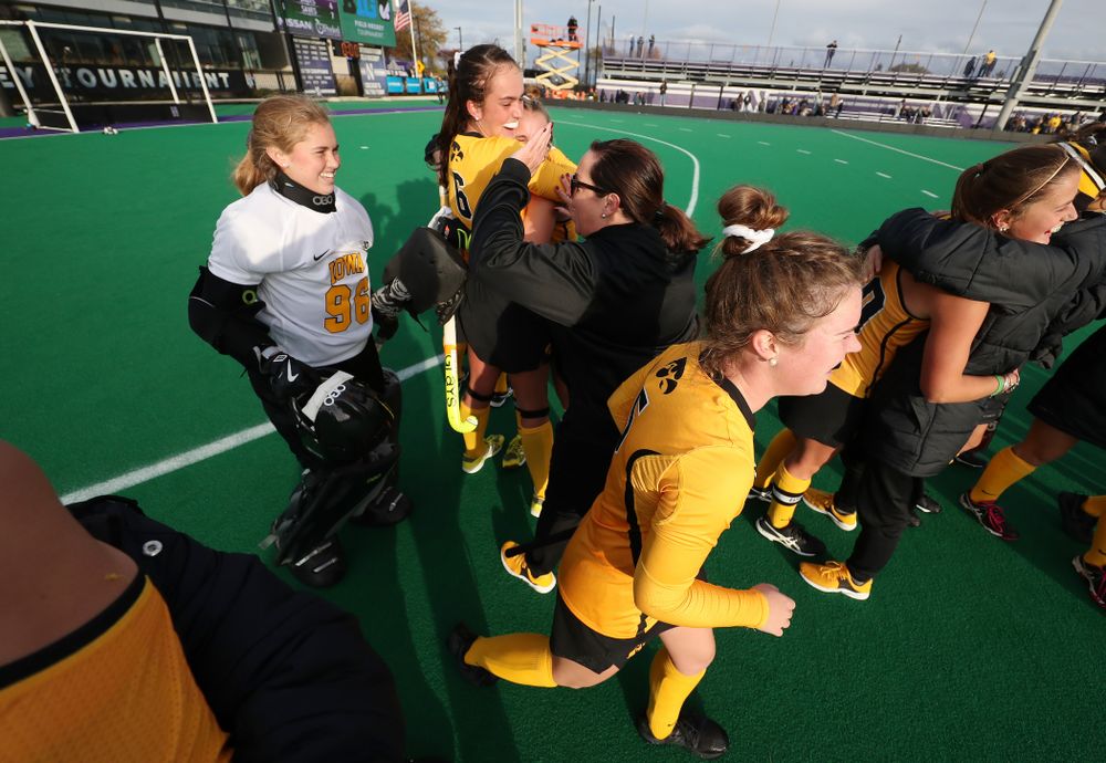 Iowa Hawkeyes head coach Lisa Cellucci high fives Leslie Speight (96) following their game against the Michigan Wolverines in the semi-finals of the Big Ten Tournament Friday, November 2, 2018 at Lakeside Field on the campus of Northwestern University in Evanston, Ill. (Brian Ray/hawkeyesports.com)