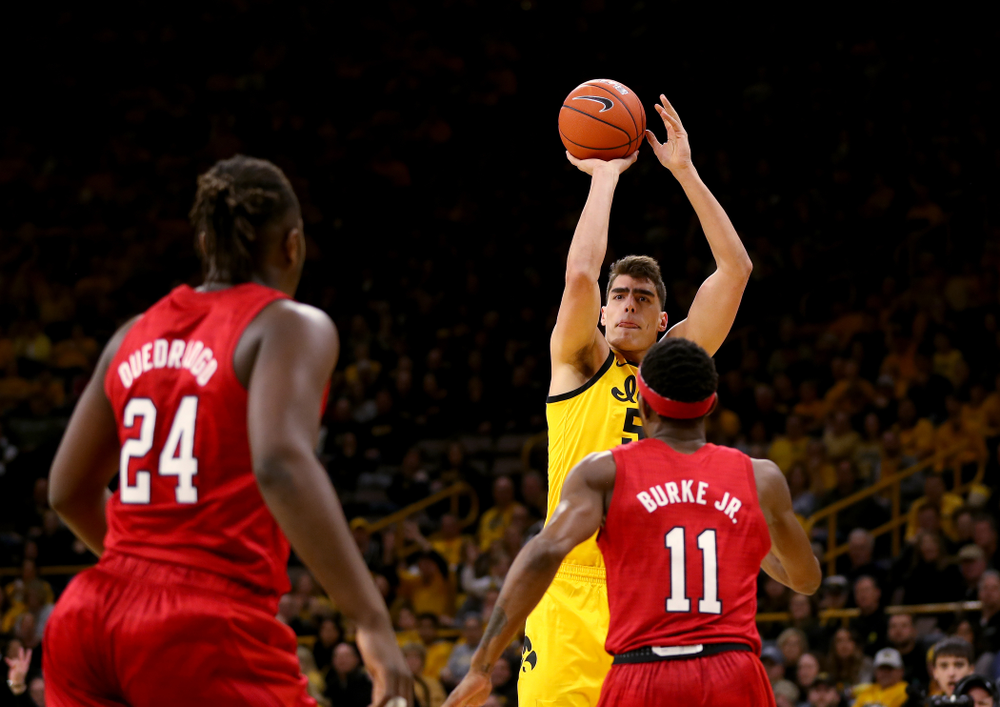 Iowa Hawkeyes forward Luka Garza (55) knocks down a three point basket against the Nebraska Cornhuskers Saturday, February 8, 2020 at Carver-Hawkeye Arena. (Brian Ray/hawkeyesports.com)
