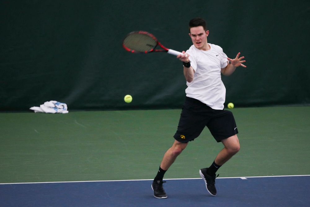 Iowa's Jonas Larsen at a tennis match vs Drake Friday, March 8, 2019 at the Hawkeye Tennis and Recreation Complex. (Lily Smith/hawkeyesports.com)