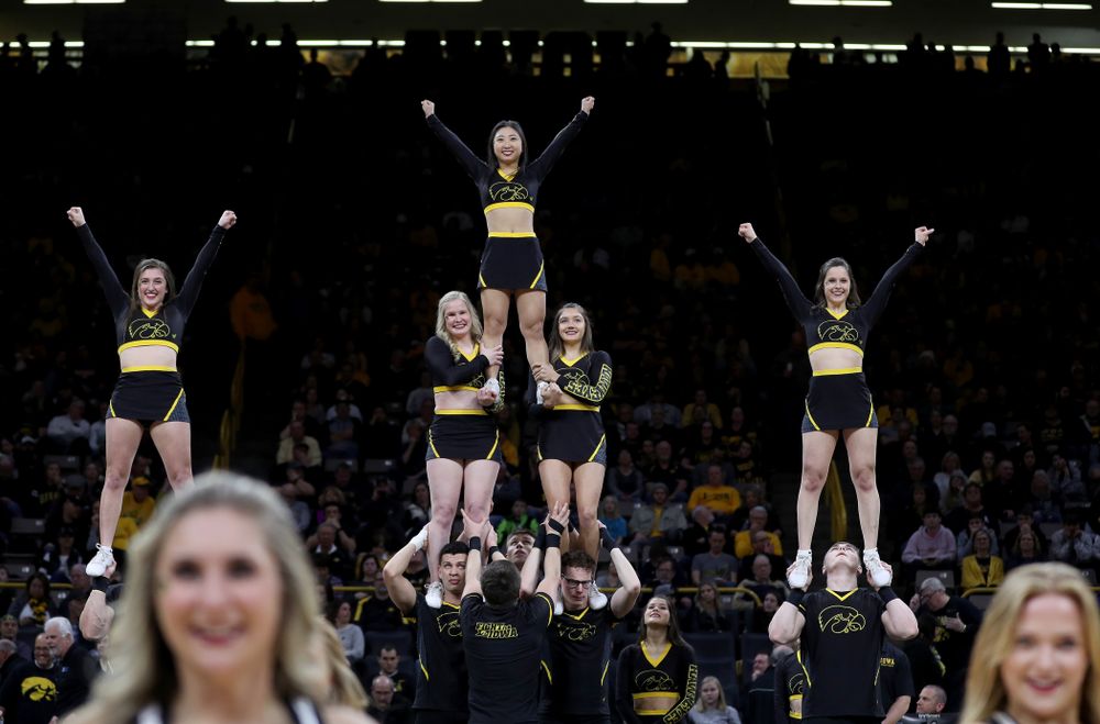 The Iowa Cheerleaders and Dance Team perform on senior night at half-time of the Iowa Hawkeyes game against the Purdue Boilermakers Tuesday, March 3, 2020 at Carver-Hawkeye Arena. (Brian Ray/hawkeyesports.com)