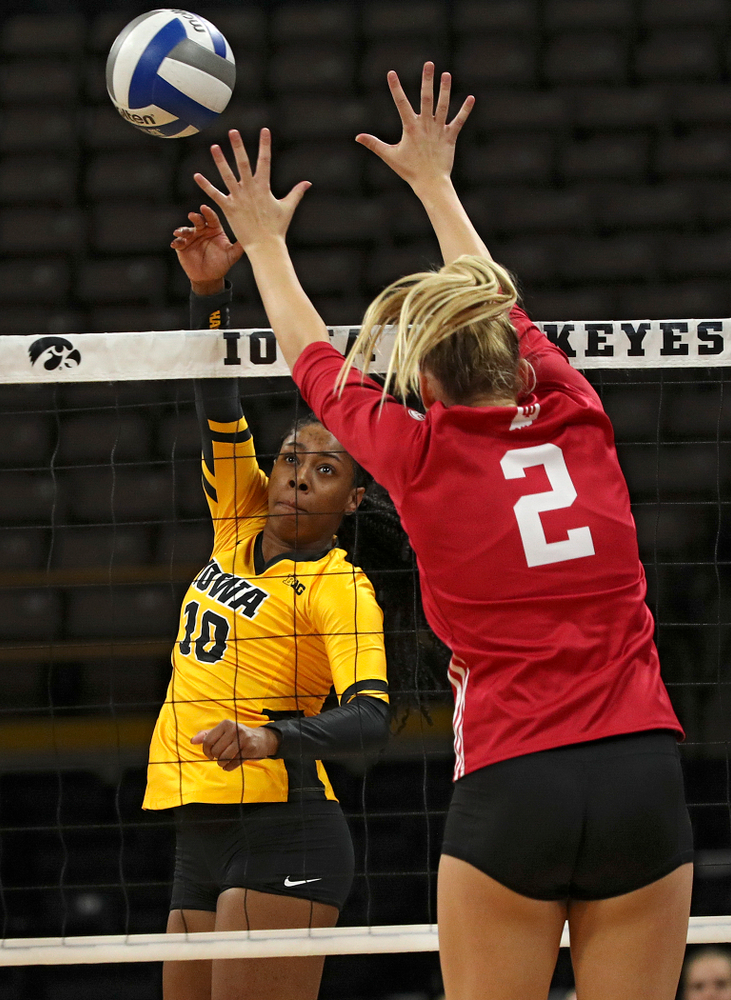 Iowa’s Griere Hughes (10) sends the ball over the net during their match at Carver-Hawkeye Arena in Iowa City on Sunday, Oct 20, 2019. (Stephen Mally/hawkeyesports.com)