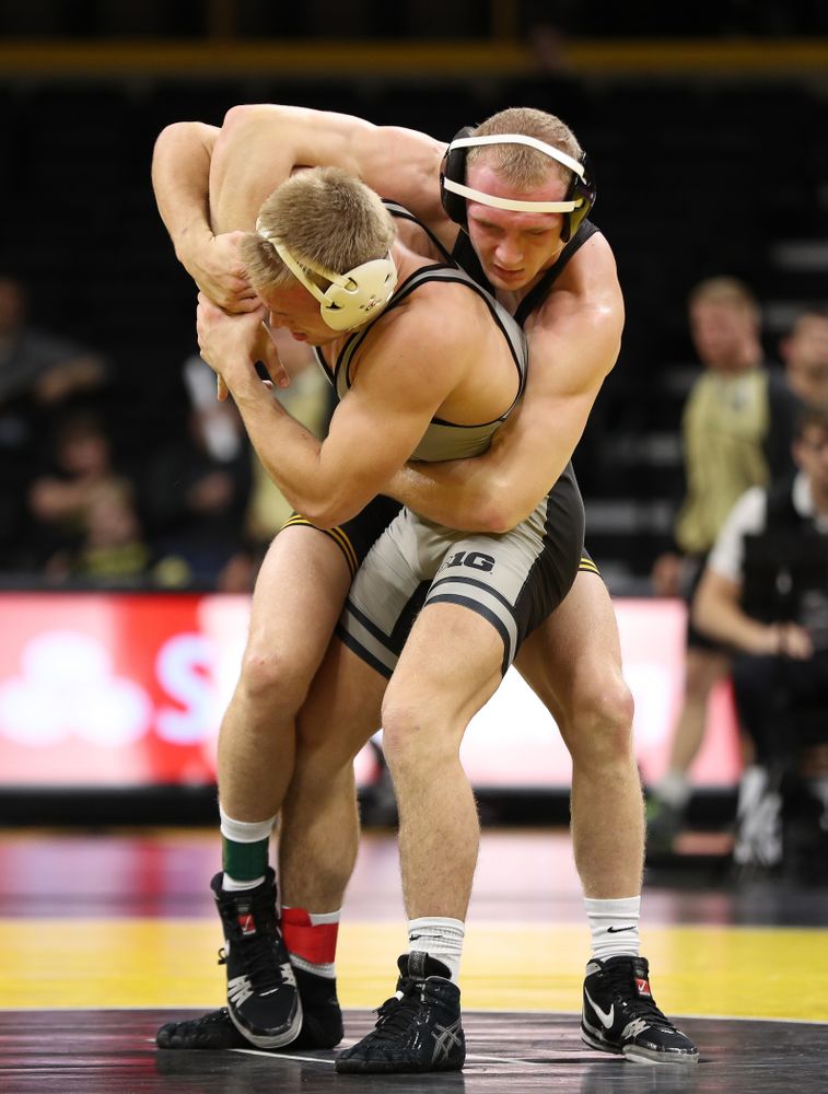 Iowa's Kaleb Young wrestles Purdue's Griffin Parriott at 157 pounds Saturday, November 24, 2018 at Carver-Hawkeye Arena. (Brian Ray/hawkeyesports.com)