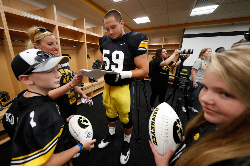 Iowa Hawkeyes offensive lineman Ross Reynolds (59) during Kids Day Saturday, August 11, 2018 at Kinnick Stadium. (Brian Ray/hawkeyesports.com)