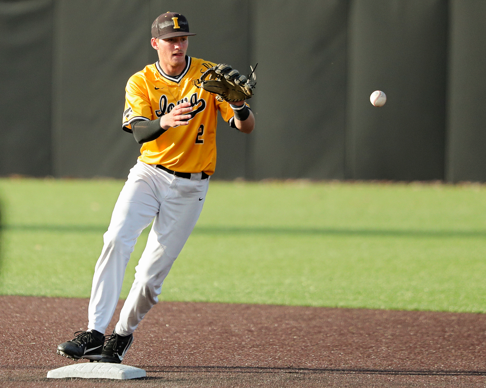 Iowa infielder Brendan Sher (2) pulls in a throw as he turns a double play during the fourth inning of the first game of the Black and Gold Fall World Series at Duane Banks Field in Iowa City on Tuesday, Oct 15, 2019. (Stephen Mally/hawkeyesports.com)
