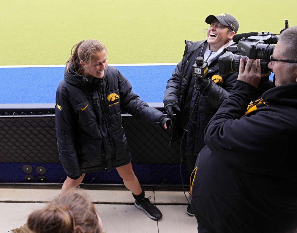 Iowa’s Sophie Sunderland (20) is interviewed by Ashley Renteria, strength coach, during their practice at Karen Shelton Stadium in Chapel Hill, N.C. on Saturday, Nov 16, 2019. (Stephen Mally/hawkeyesports.com)