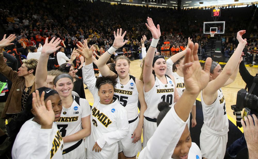 The Iowa Hawkeyes wave to their fans after winning their game during the first round of the 2019 NCAA Women's Basketball Tournament at Carver Hawkeye Arena in Iowa City on Friday, Mar. 22, 2019. (Stephen Mally for hawkeyesports.com)