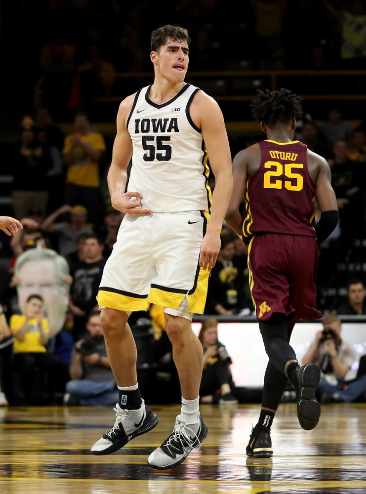 Iowa Hawkeyes forward Luka Garza (55) celebrates a three point basket against the Minnesota Golden Gophers Monday, December 9, 2019 at Carver-Hawkeye Arena. (Brian Ray/hawkeyesports.com)