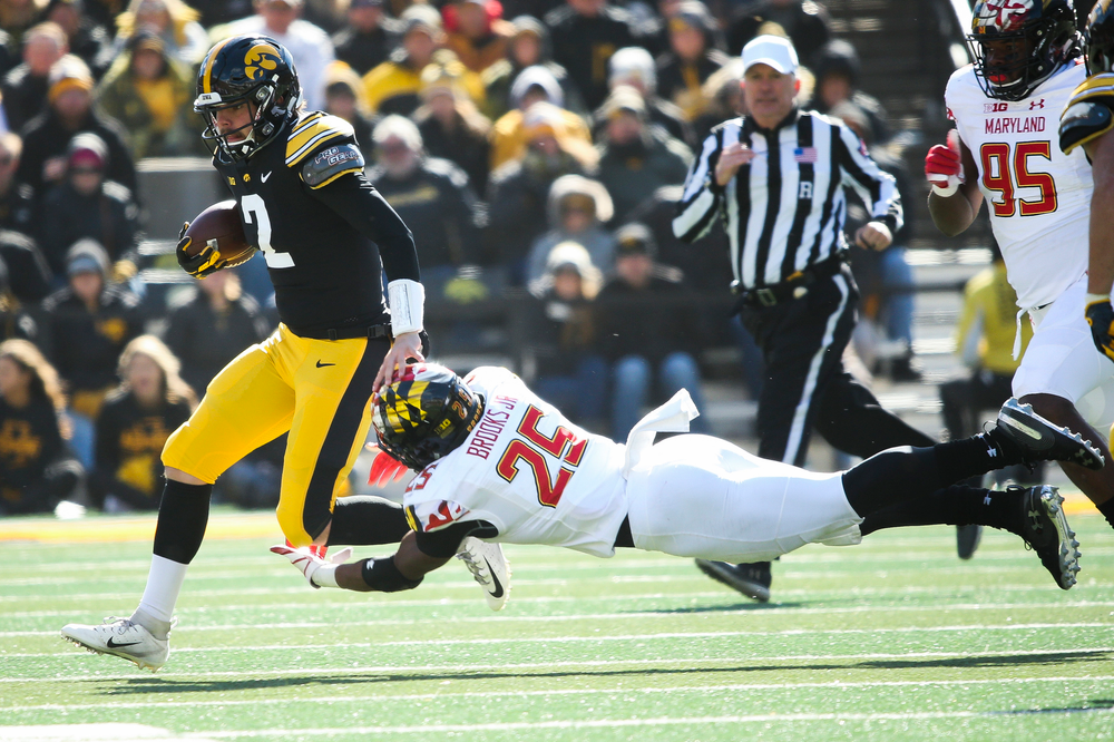 Iowa Hawkeyes quarterback Peyton Mansell (2) runs the ball during a game against Maryland at Kinnick Stadium on October 20, 2018. (Tork Mason/hawkeyesports.com)