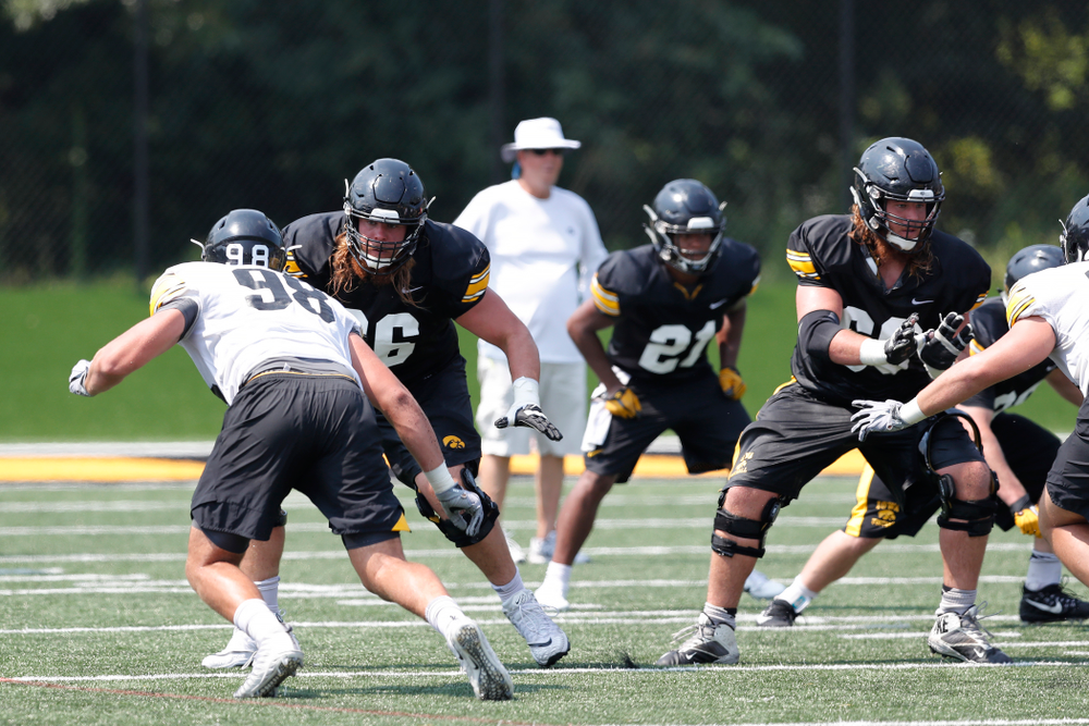 Iowa Hawkeyes offensive lineman Levi Paulsen (66) and offensive lineman Landan Paulsen (68) during practice No. 7 of fall camp Friday, August 10, 2018 at the Kenyon Football Practice Facility. (Brian Ray/hawkeyesports.com)