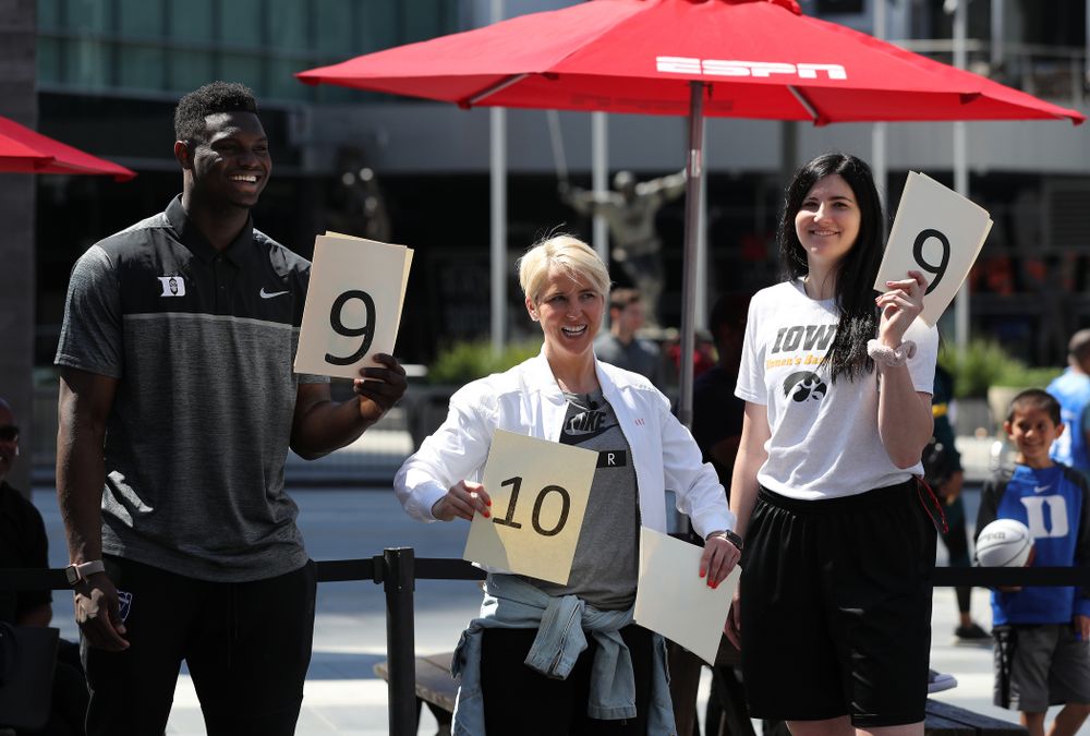 Iowa Hawkeyes forward Megan Gustafson (10) judges dunks with DukeÕs Zion Williamson during a Special Olympics event Friday, April 12, 2019 as part of the ESPN College Basketball Awards in the XBOX Plaza at LA Live. (Brian Ray/hawkeyesports.com)