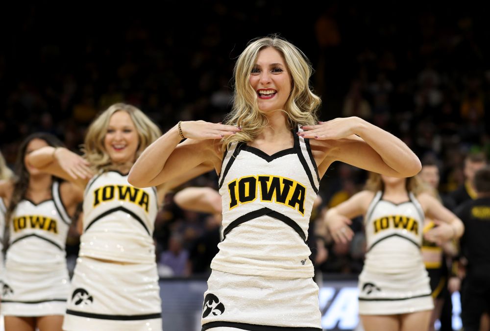 The Iowa Cheerleaders and Dance Team perform on senior night at half-time of the Iowa Hawkeyes game against the Purdue Boilermakers Tuesday, March 3, 2020 at Carver-Hawkeye Arena. (Brian Ray/hawkeyesports.com)