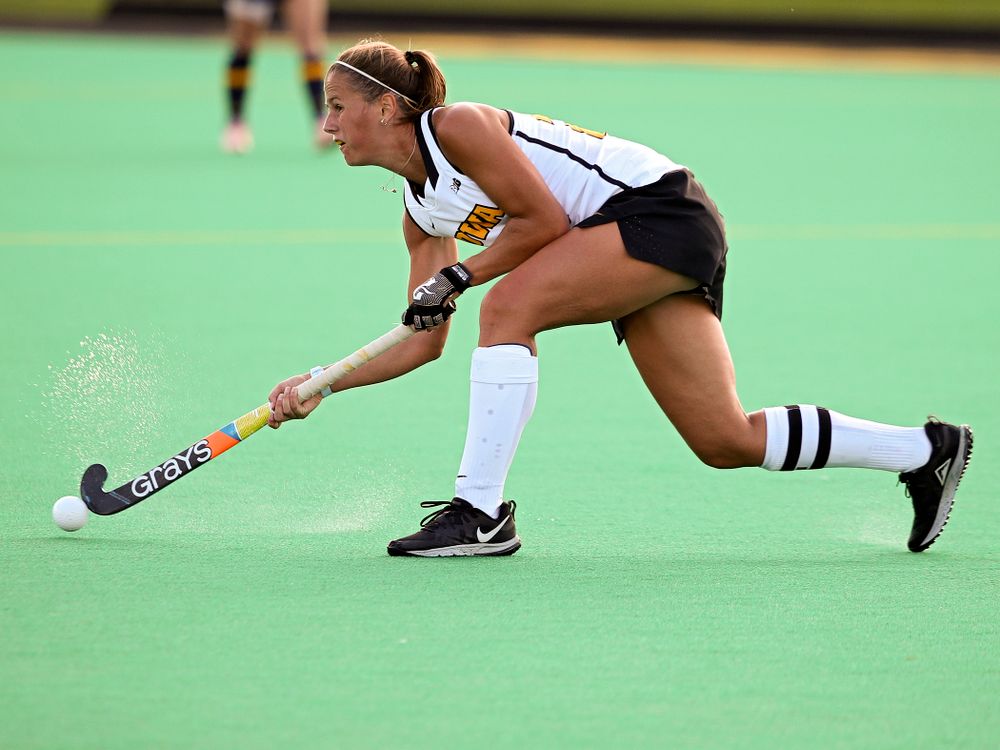 Iowa’s Sophie Sunderland (20) passes during the third quarter of their game at Grant Field in Iowa City on Friday, Sep 13, 2019. (Stephen Mally/hawkeyesports.com)