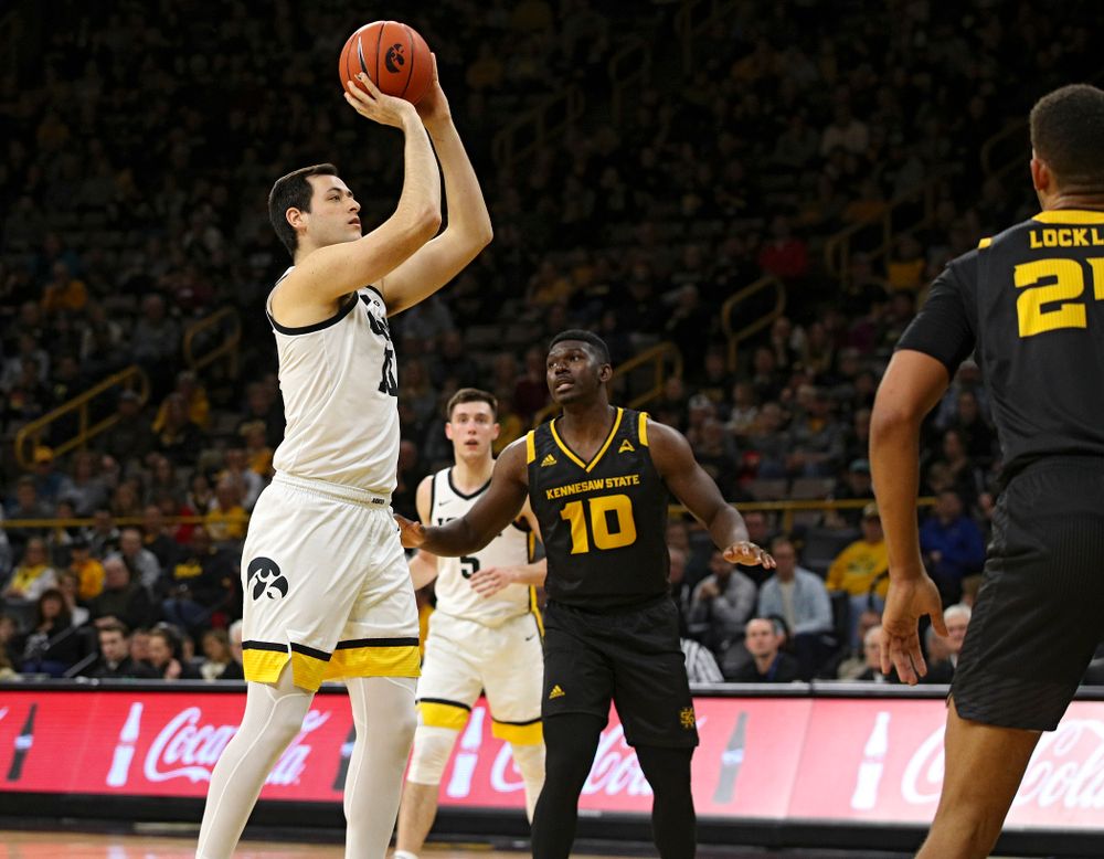 Iowa Hawkeyes forward Ryan Kriener (15) scores a basket during the second half of their their game at Carver-Hawkeye Arena in Iowa City on Sunday, December 29, 2019. (Stephen Mally/hawkeyesports.com)
