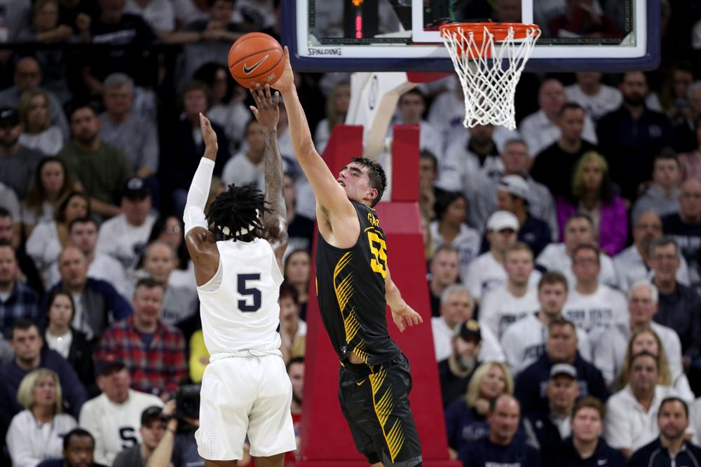 Iowa Hawkeyes forward Luka Garza (55) blocks a shot against Penn State Saturday, January 4, 2020 at the Palestra in Philadelphia. (Brian Ray/hawkeyesports.com)