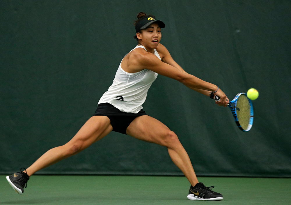 Iowa’s Michelle Bacalla returns a shot during her singles match at the Hawkeye Tennis and Recreation Complex in Iowa City on Sunday, February 23, 2020. (Stephen Mally/hawkeyesports.com)