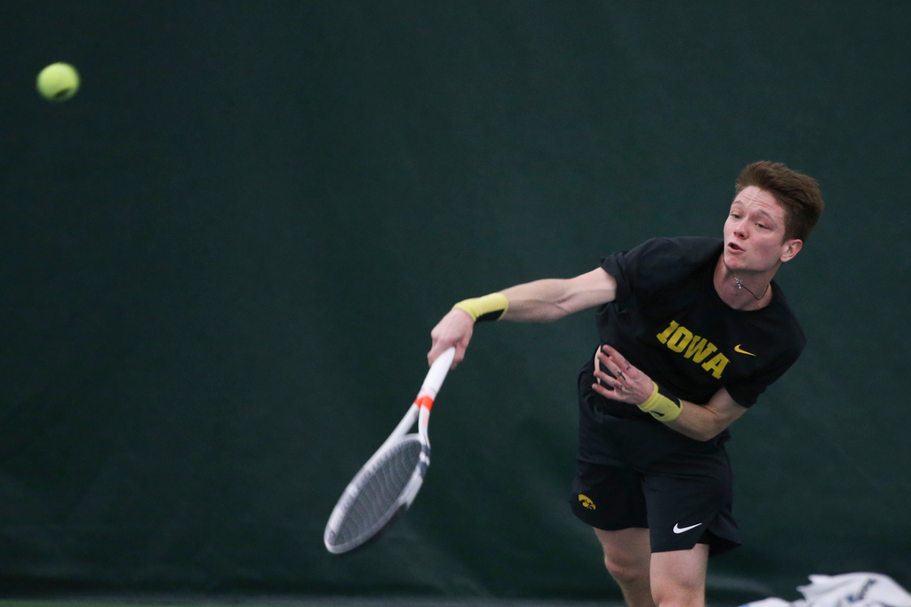 Iowa’s Jason Kerst returns a hit during the Iowa men’s tennis meet vs VCU on Saturday, February 29, 2020 at the Hawkeye Tennis and Recreation Complex. (Lily Smith/hawkeyesports.com)