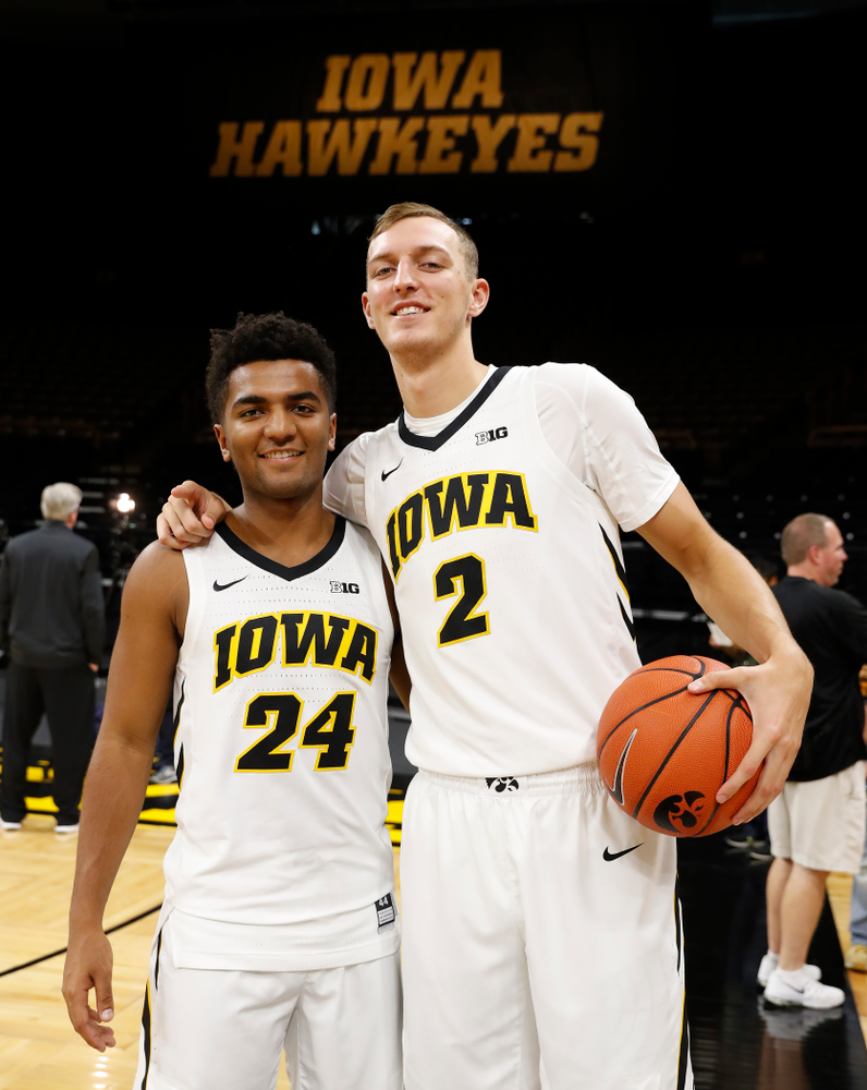 Iowa Hawkeyes guard Nicolas Hobbs (24) and forward Jack Nunge (2) during the team's annual media day Monday, October 8, 2018 at Carver-Hawkeye Arena. (Brian Ray/hawkeyesports.com)