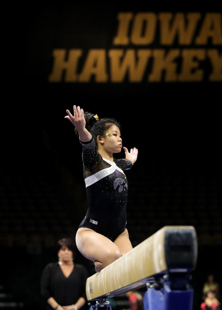 Iowa's Misty-Jade Carlson competes on the beam against the Rutgers Scarlet Knights Saturday, January 26, 2019 at Carver-Hawkeye Arena. (Brian Ray/hawkeyesports.com)